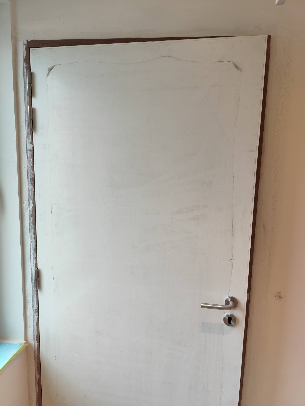 Réparation autour de la porte